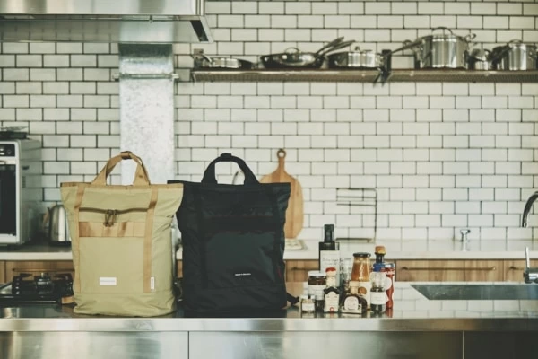 DEAN & DELUCAとBRIEFINGがコラボ。機能美と携帯性を備えた”WAYバック